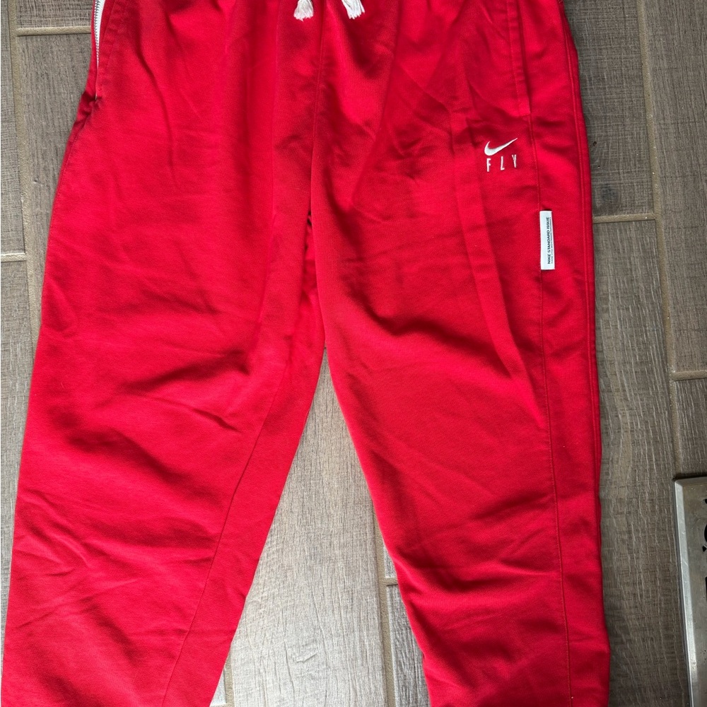 Nike women’s Dri-Fit Fly Red sweatpants size Medium
